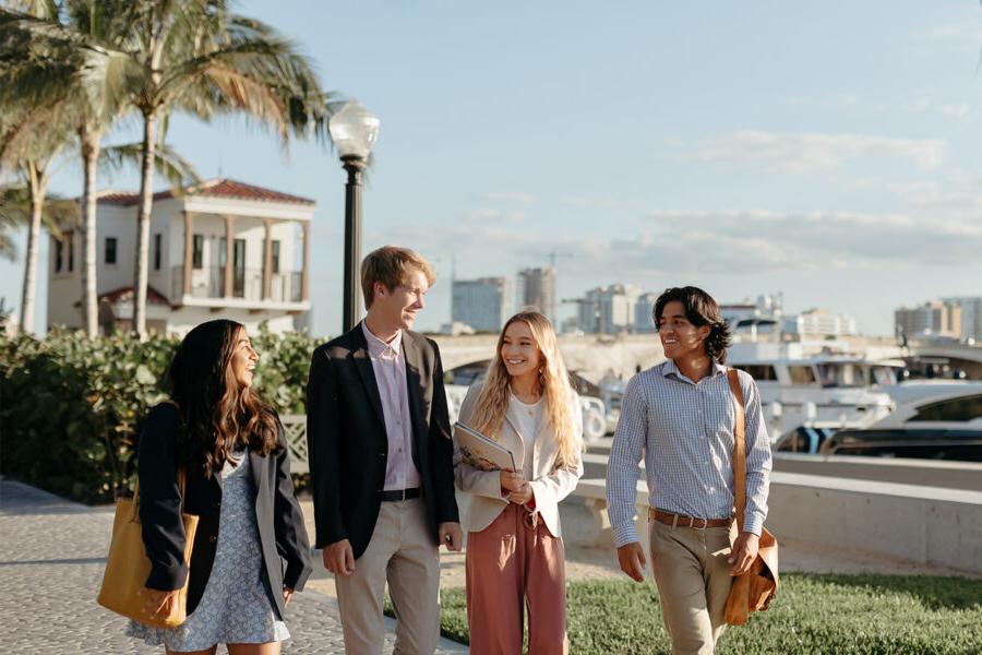 master of business administration mba students walk near the intercoastal waterway in 西<a href='http://rma.cp009x.com'>推荐全球最大网赌正规平台欢迎您</a>.